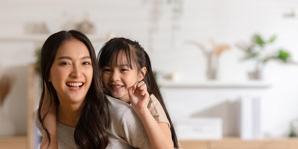 young-woman-with-child-on-back